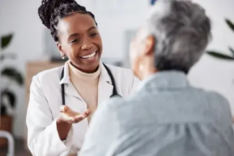 Doctor consulting with patient